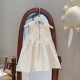 Cream Smocked Dress